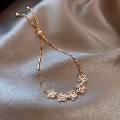 Patrizia® | Bracelet en fleurs en cristal luxueux en or