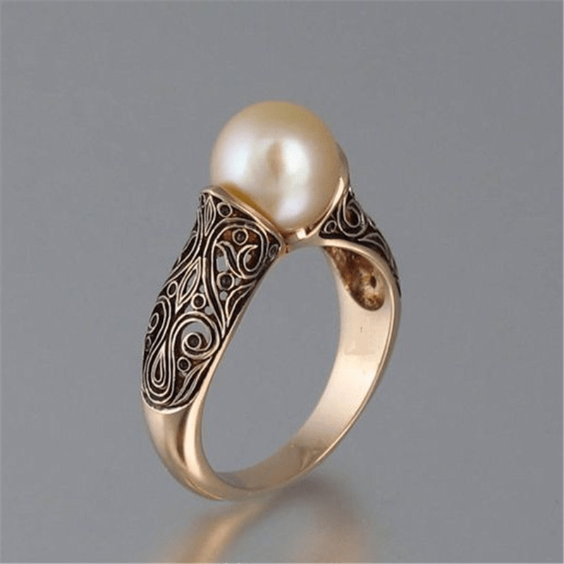 Bague en or vintage avec perles